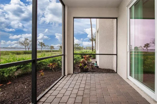 a view of a glass door with a porch