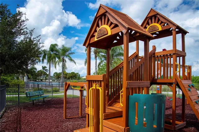 an aerial view of a house with a lake view
