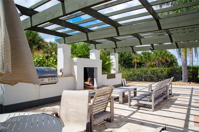 a view of a house with swimming pool yard and patio