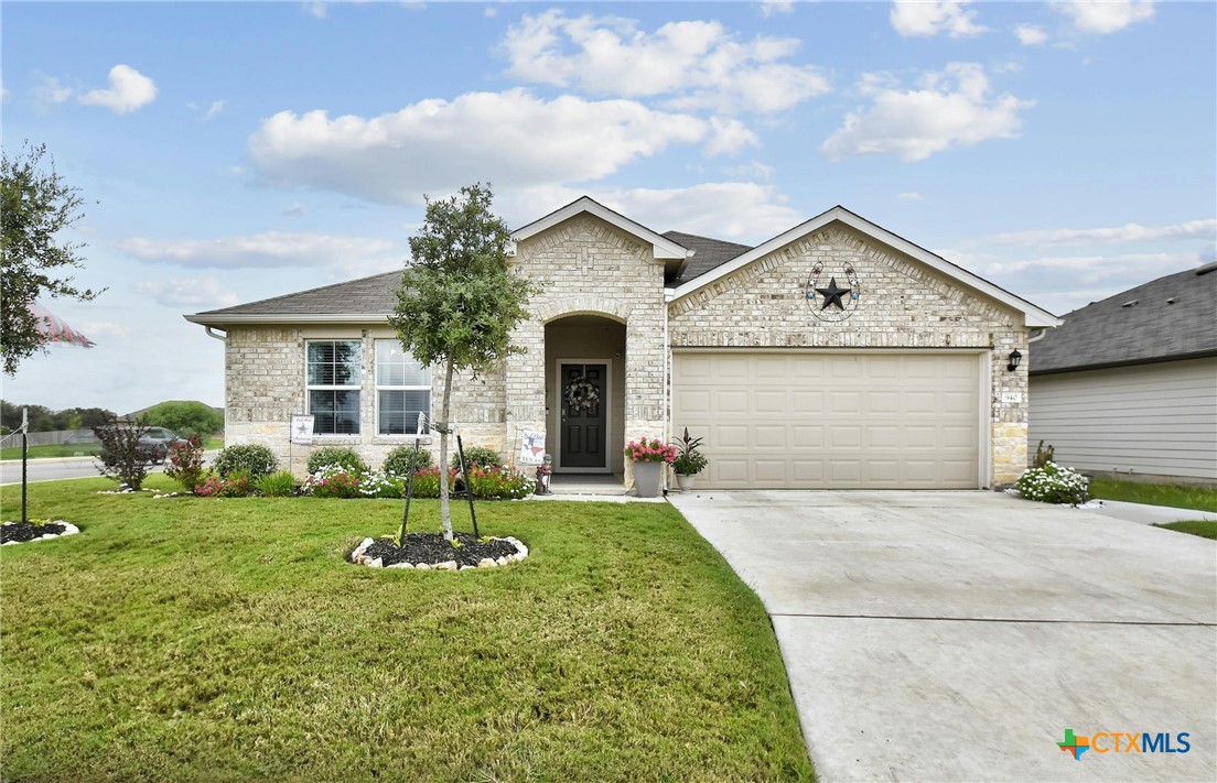940 Armadillo Drive Seguin, TX 78155 - Photo 1 of 1 a front view of a house with a yard and garage