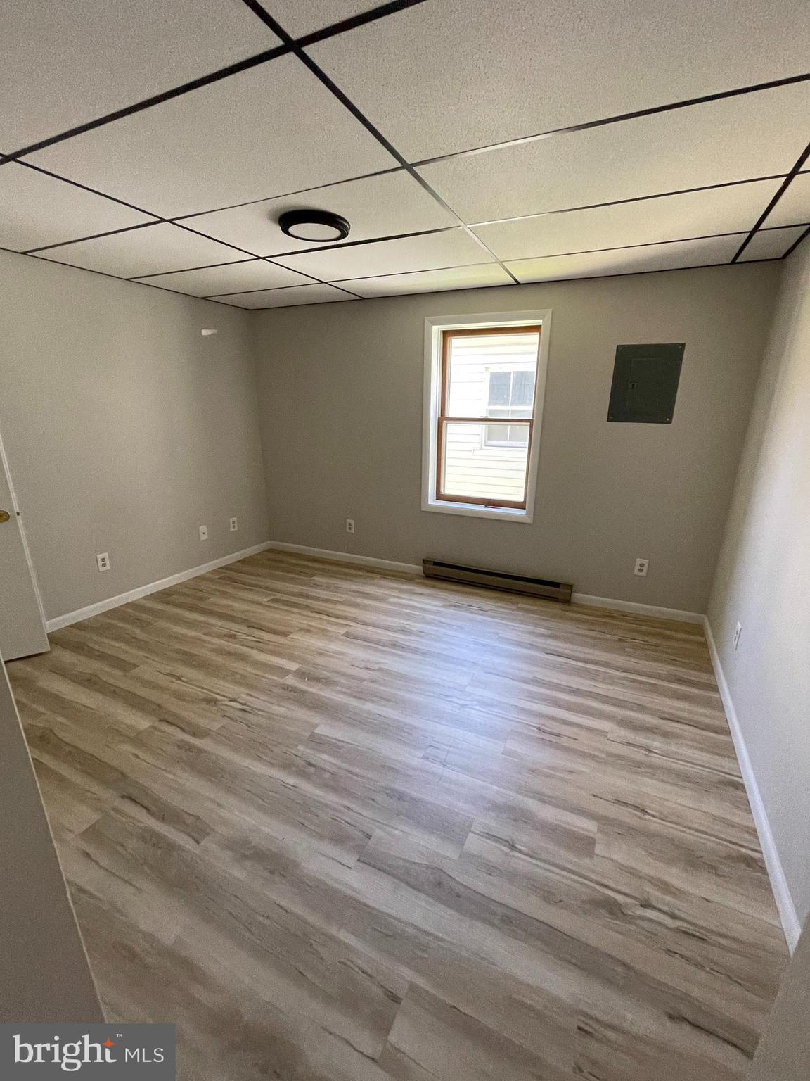 307 Willis Street Cambridge, MD 21613 - Photo 4 of 9 a view of an empty room with a window