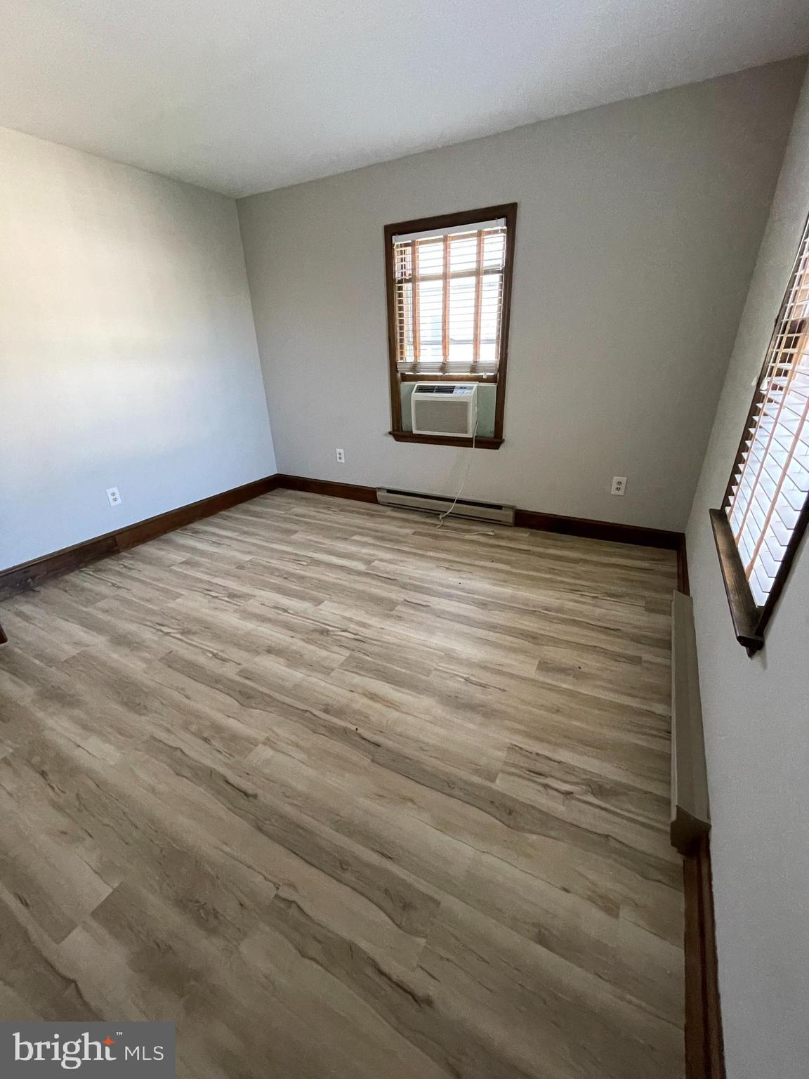 307 Willis Street Cambridge, MD 21613 - Photo 8 of 9 an empty room with windows