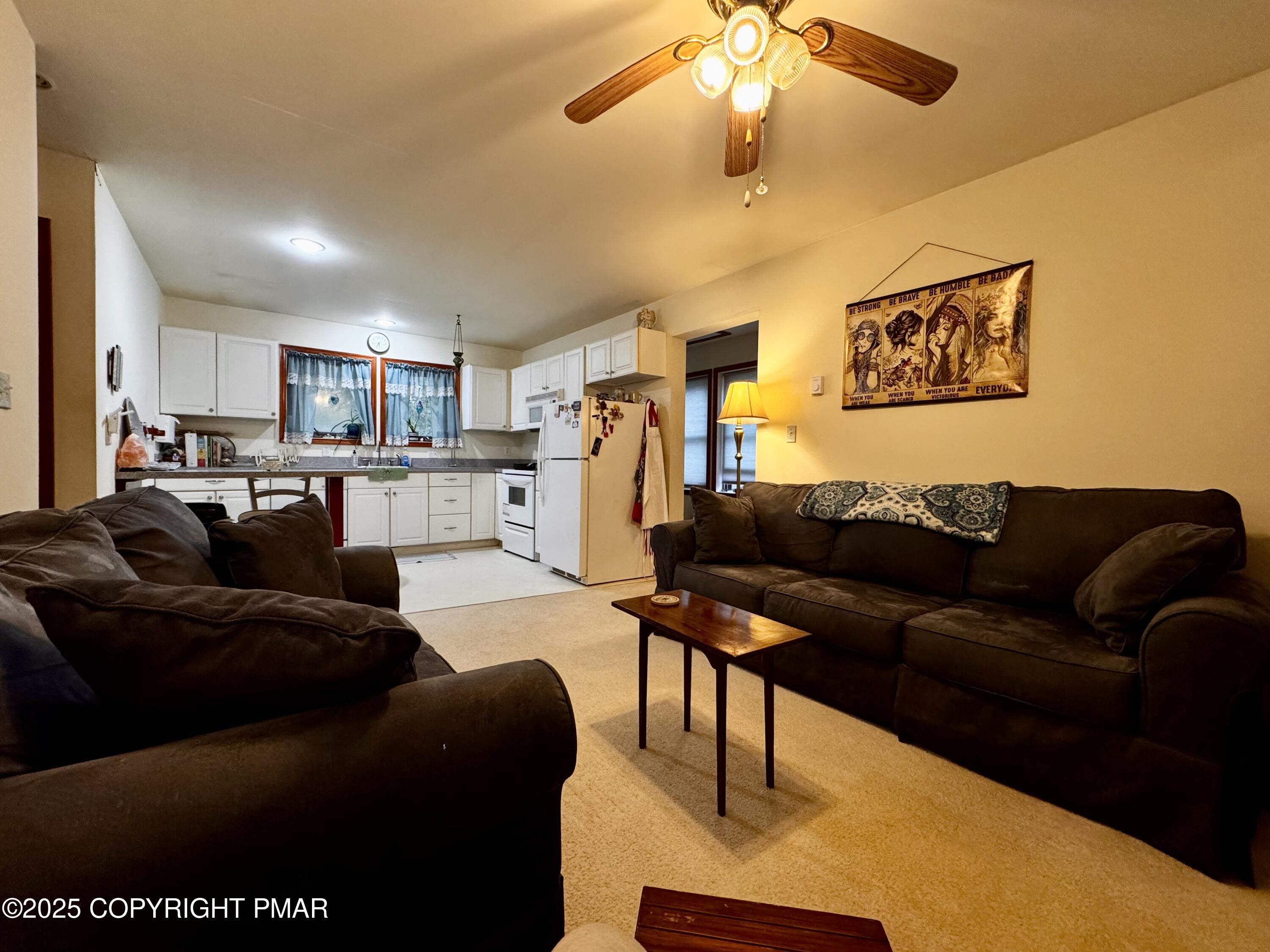 102 Indian Trail Road Jim Thorpe, PA 18229 - Photo 15 of 32 living rm toward kitchen