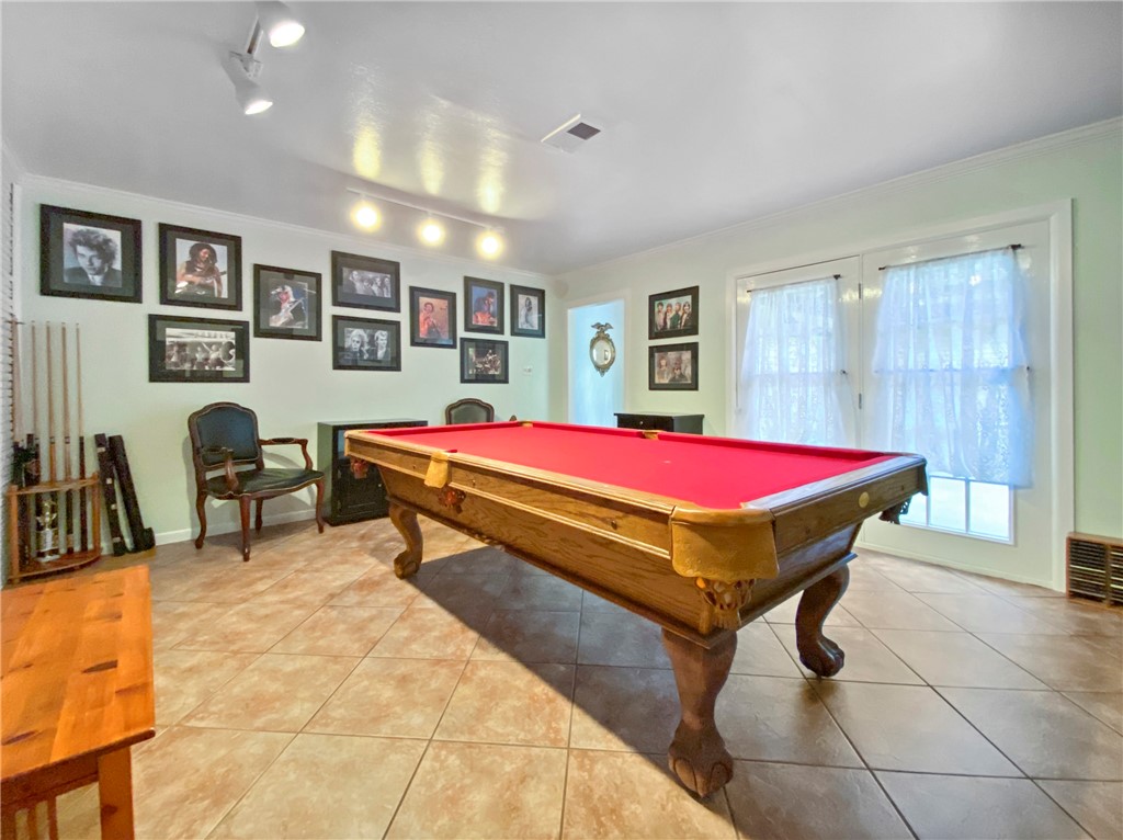 1617 Rose Drive Alice, TX 78332 - Photo 21 of 23 a room with pool table and windows