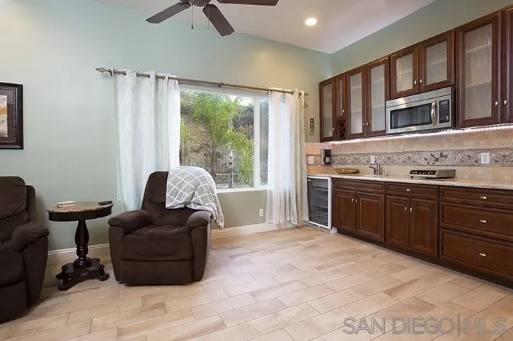 2641 Firebrand Place Alpine, CA 91901 - Photo 14 of 25 a living room with furniture and a large window