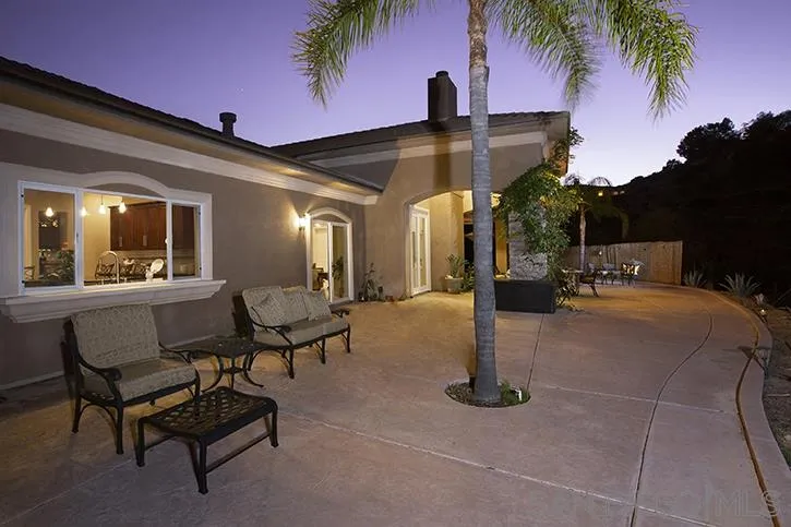 2641 Firebrand Place Alpine, CA 91901 - Photo 22 of 25 a swimming pool with outdoor seating