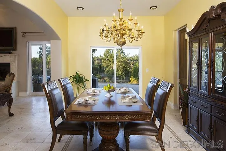 2641 Firebrand Place Alpine, CA 91901 - Photo 9 of 25 a view of a dining room with furniture wooden floor and chandelier