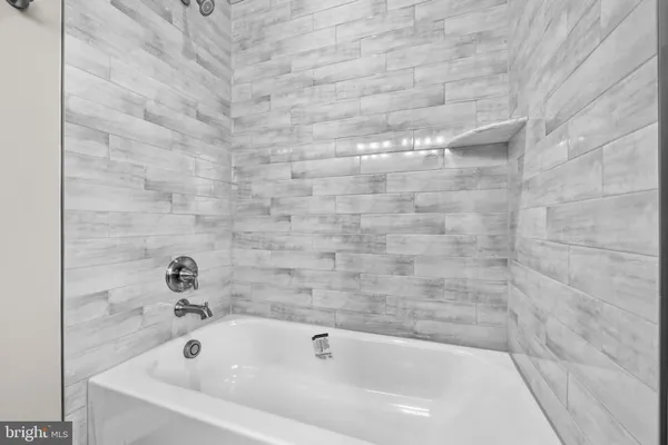 a bathroom with a bathtub