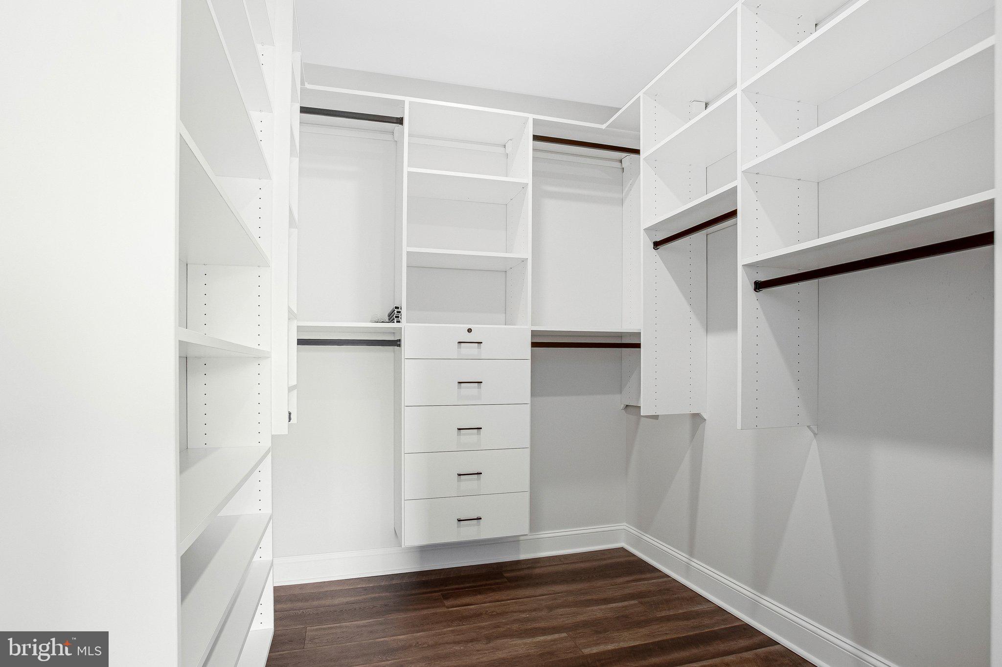 6146 Drum Point Road Deale, MD 20751 - Photo 42 of 75 a view of walk in closet with empty racks