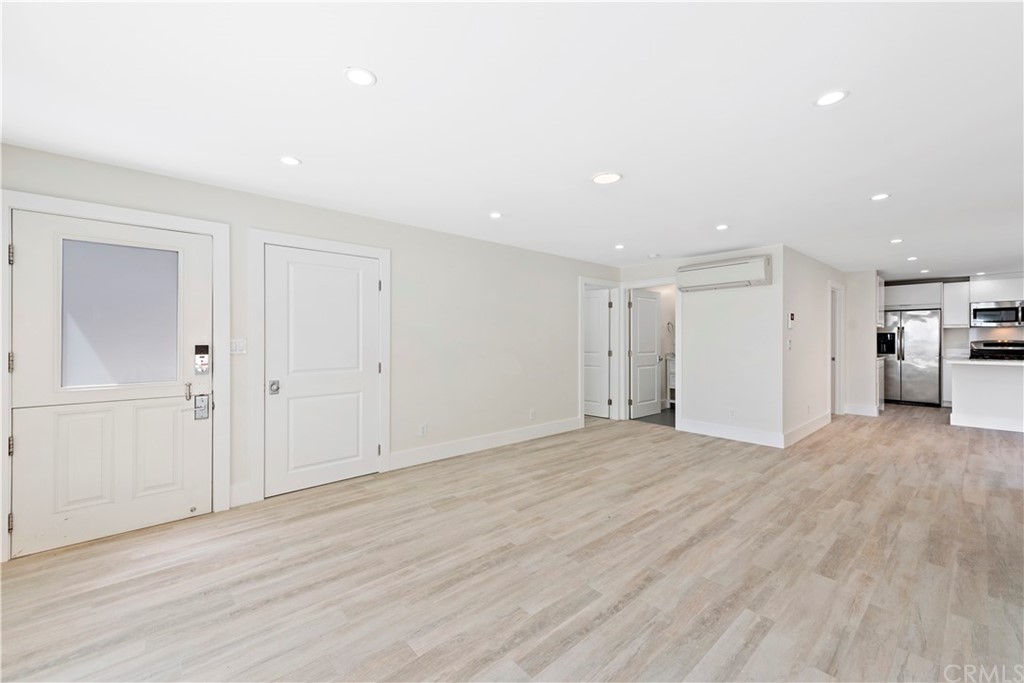 827 Cliff Drive Laguna Beach, CA 92651 - Photo 12 of 19 a view of empty room with wooden floor