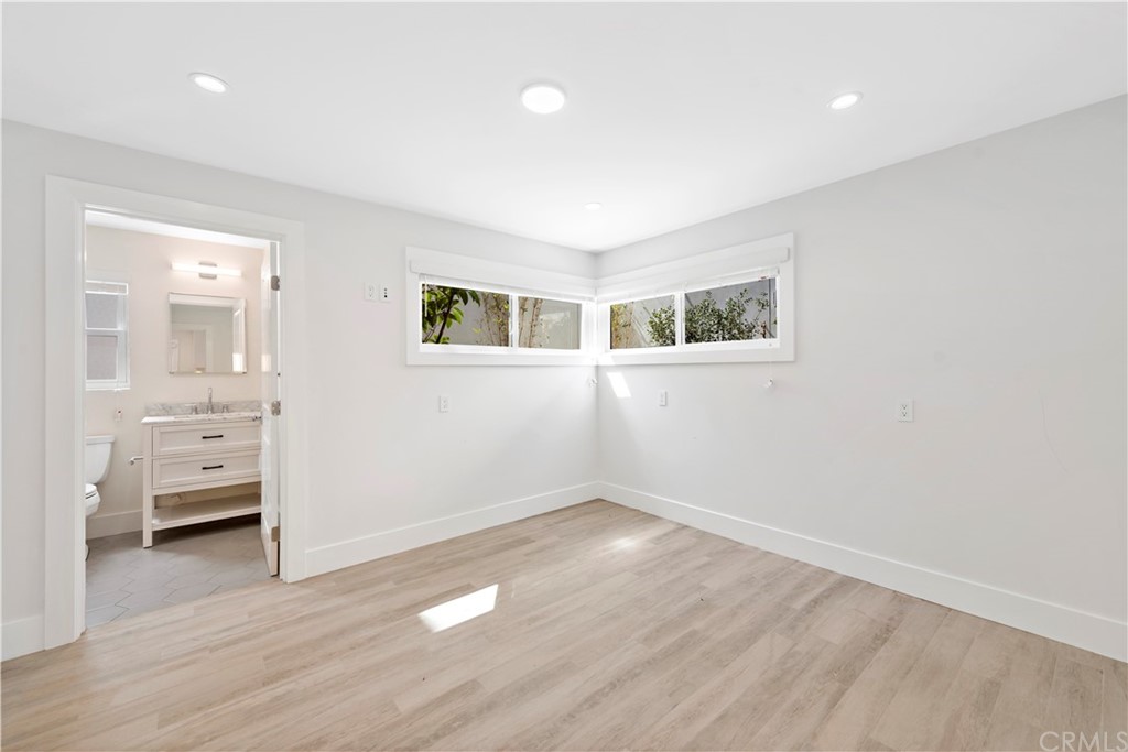 827 Cliff Drive Laguna Beach, CA 92651 - Photo 13 of 19 wooden floor in an empty room with a window
