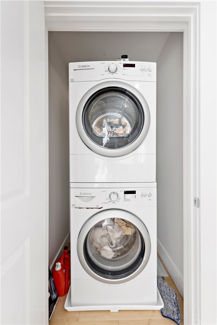 827 Cliff Drive Laguna Beach, CA 92651 - Photo 16 of 19 a utility room with dryer and washer