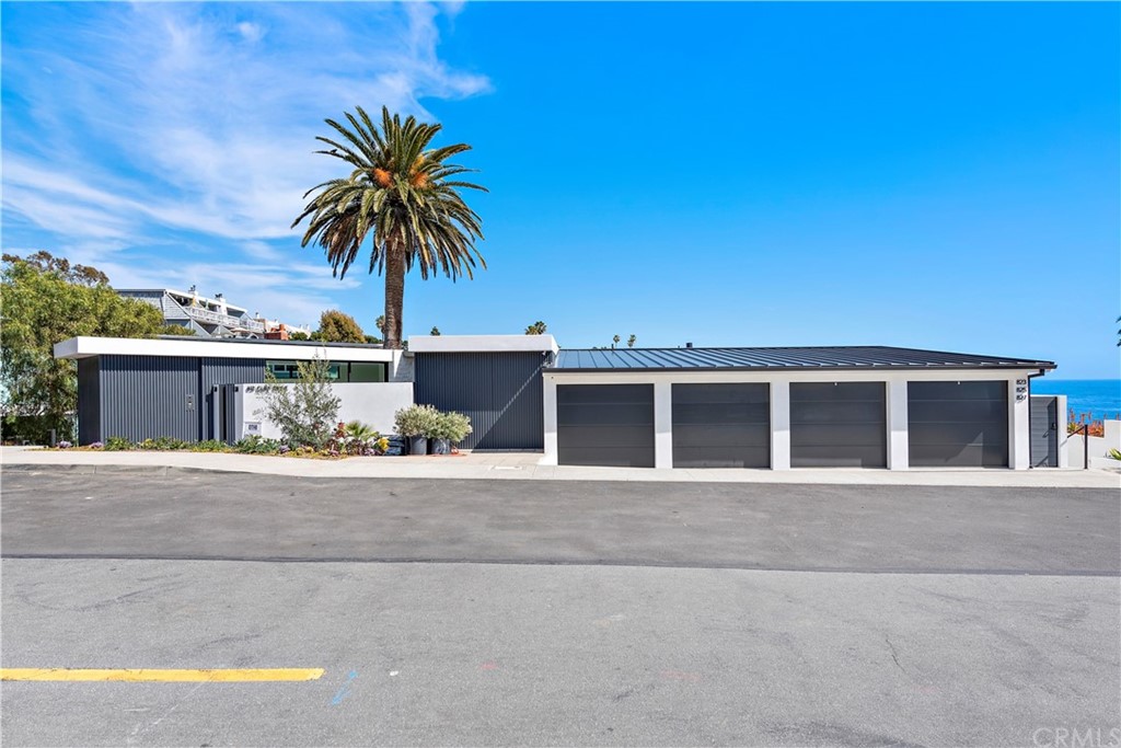 827 Cliff Drive Laguna Beach, CA 92651 - Photo 18 of 19 front view of a house with a street