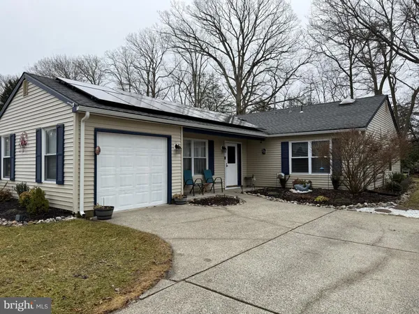 a backyard of a house with seating space