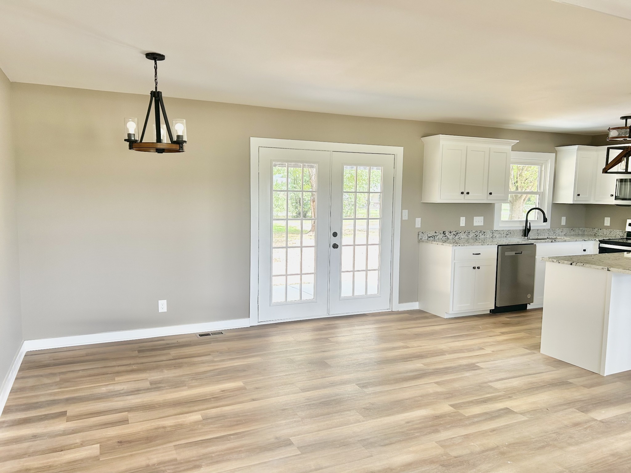 477 Pocahontas Road Morrison, TN 37357 - Photo 14 of 48 Dinning area with double doors leading to the back patio