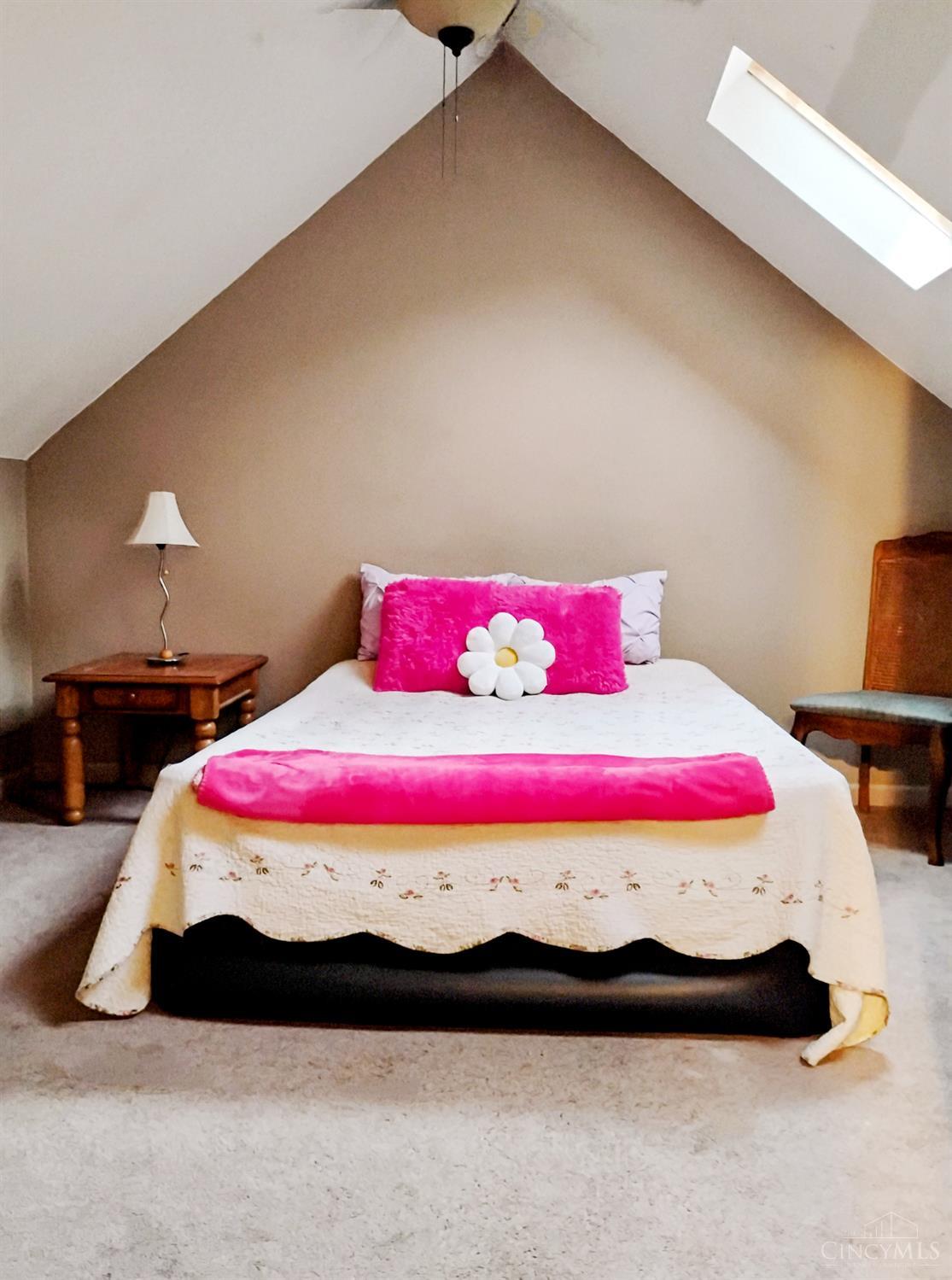 5125 Hamilton Cleves Road Cleves, OH 45002 - Photo 5 of 16 Upper level bedroom with vaulted ceiling and skylights