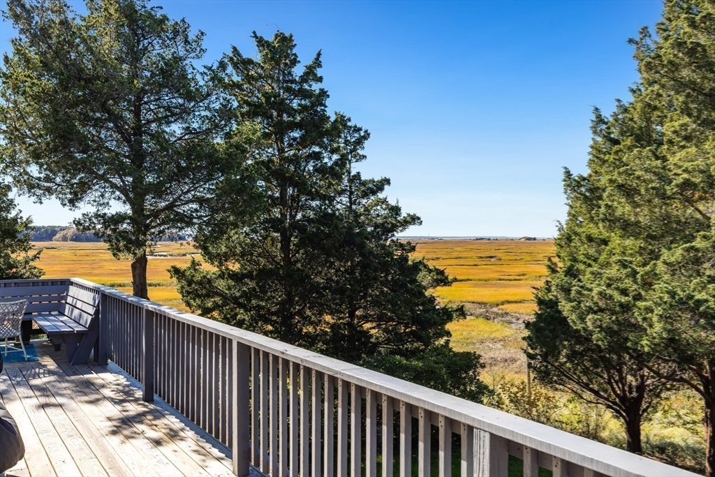 655 Herring Brook Road Eastham, MA 02642 - Photo 17 of 40 a balcony with view of lake view