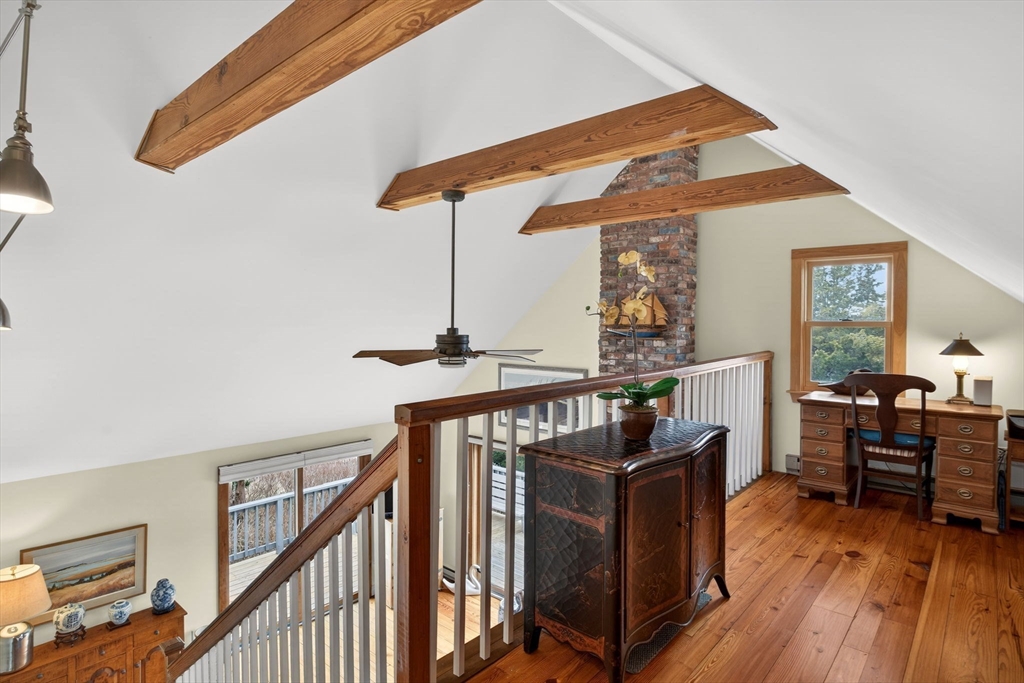 655 Herring Brook Road Eastham, MA 02642 - Photo 18 of 40 a view of a livingroom with furniture and staircase
