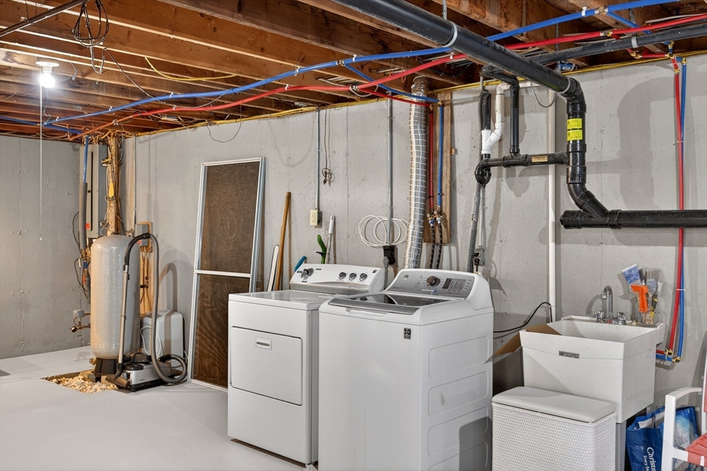 655 Herring Brook Road Eastham, MA 02642 - Photo 26 of 40 a utility room with dryer and washer