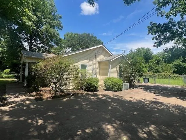 a view of a house with a patio