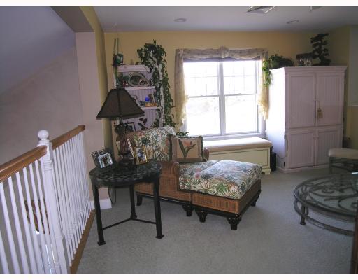 323 Village Road, Unit 32 Tiverton, RI 02878 - Photo 7 of 8 Other. Relaxing loft area overlooks main floor living and the wondrous waterview and sunsets. A second master suite is located off this area.