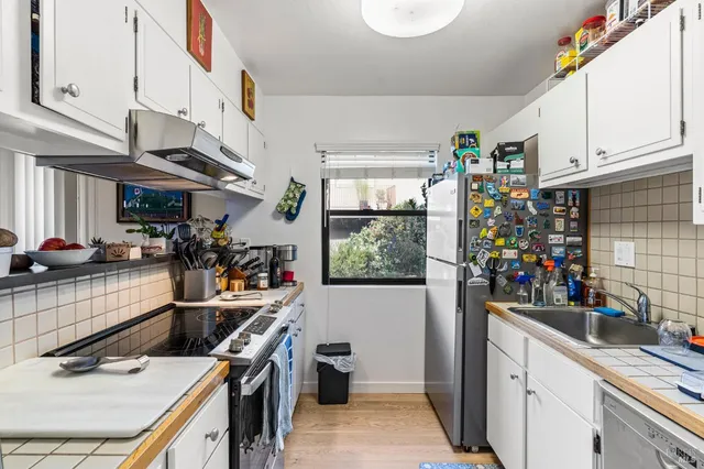 a living room with furniture fireplace and flat screen tv