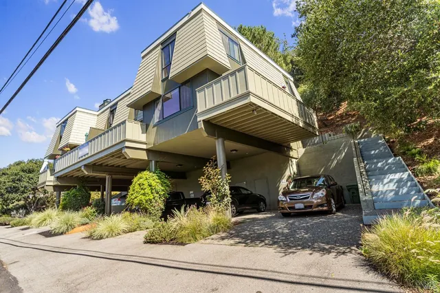 a view of a house with a street