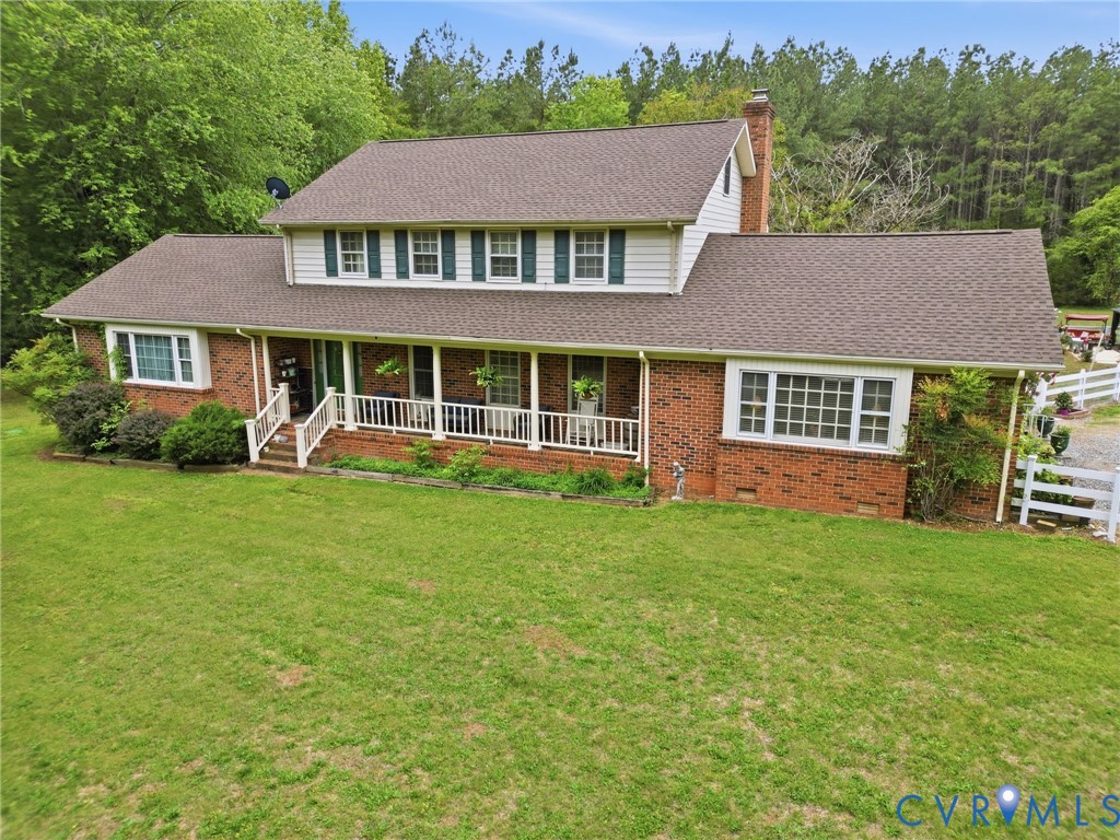 11016 Pridesville Road Amelia Court House, VA 23002 - Photo 54 of 54 Traditional brick and siding exterior with a welco