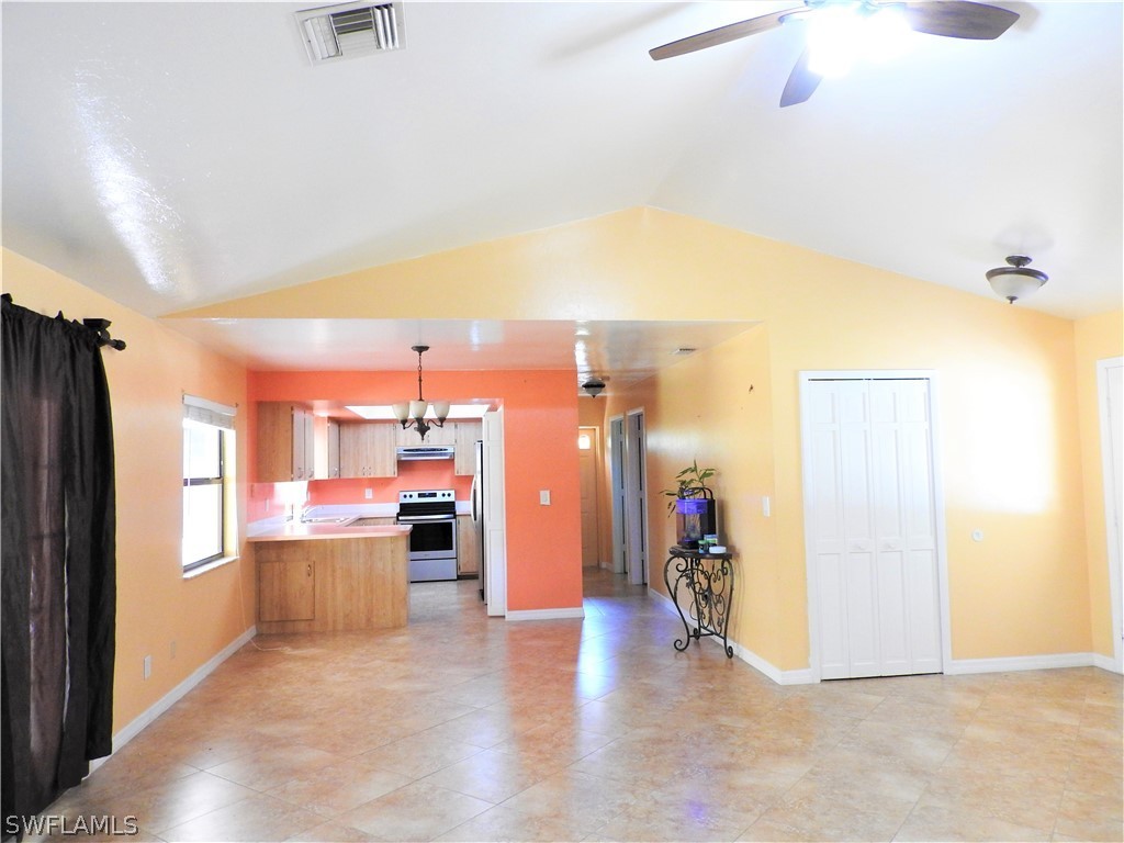 5936 Tarpon Road Bokeelia, FL 33922 - Photo 3 of 17 a view of a kitchen and a window