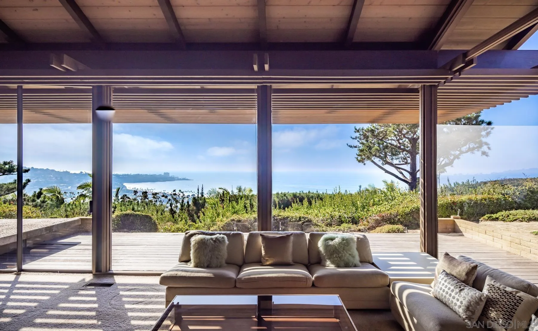 8404 Prestwick Drive La Jolla, CA 92037 - Photo 10 of 17 a living room with large windows