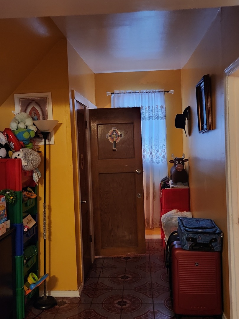 3334 North Harding Avenue Chicago, IL 60618 - Photo 3 of 25 a front view of a house with entryway