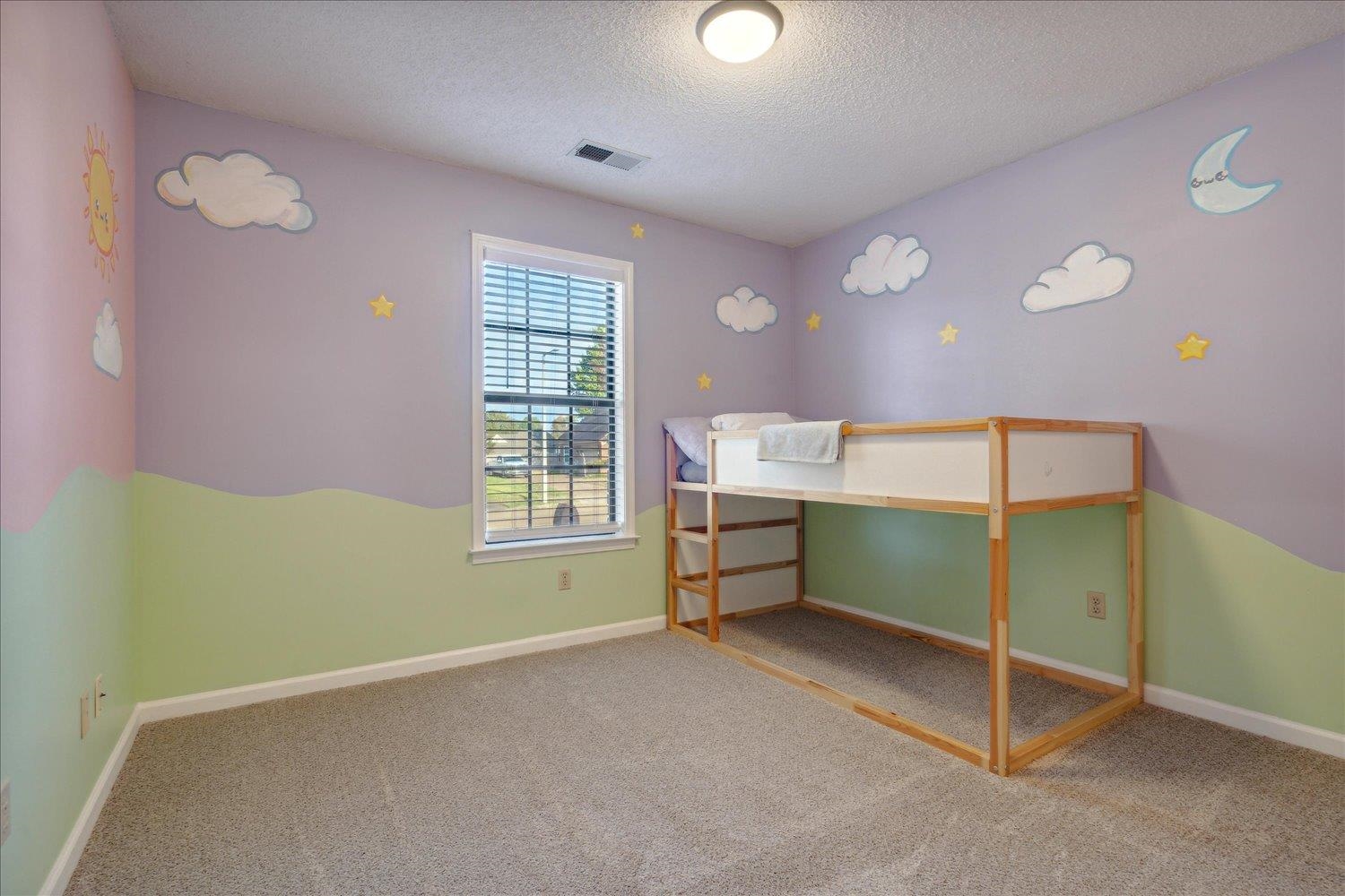 6893 Andrews Road Bartlett, TN 38135 - Photo 21 of 30 Unfurnished bedroom featuring carpet flooring and a textured ceiling