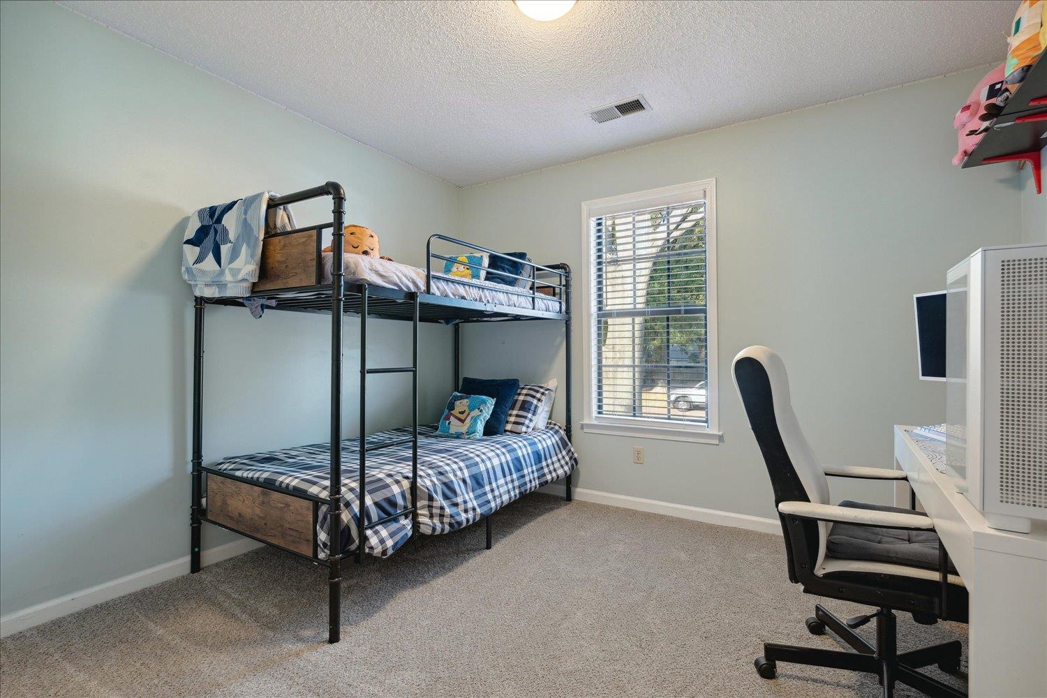 6893 Andrews Road Bartlett, TN 38135 - Photo 22 of 30 Bedroom with a textured ceiling and carpet flooring