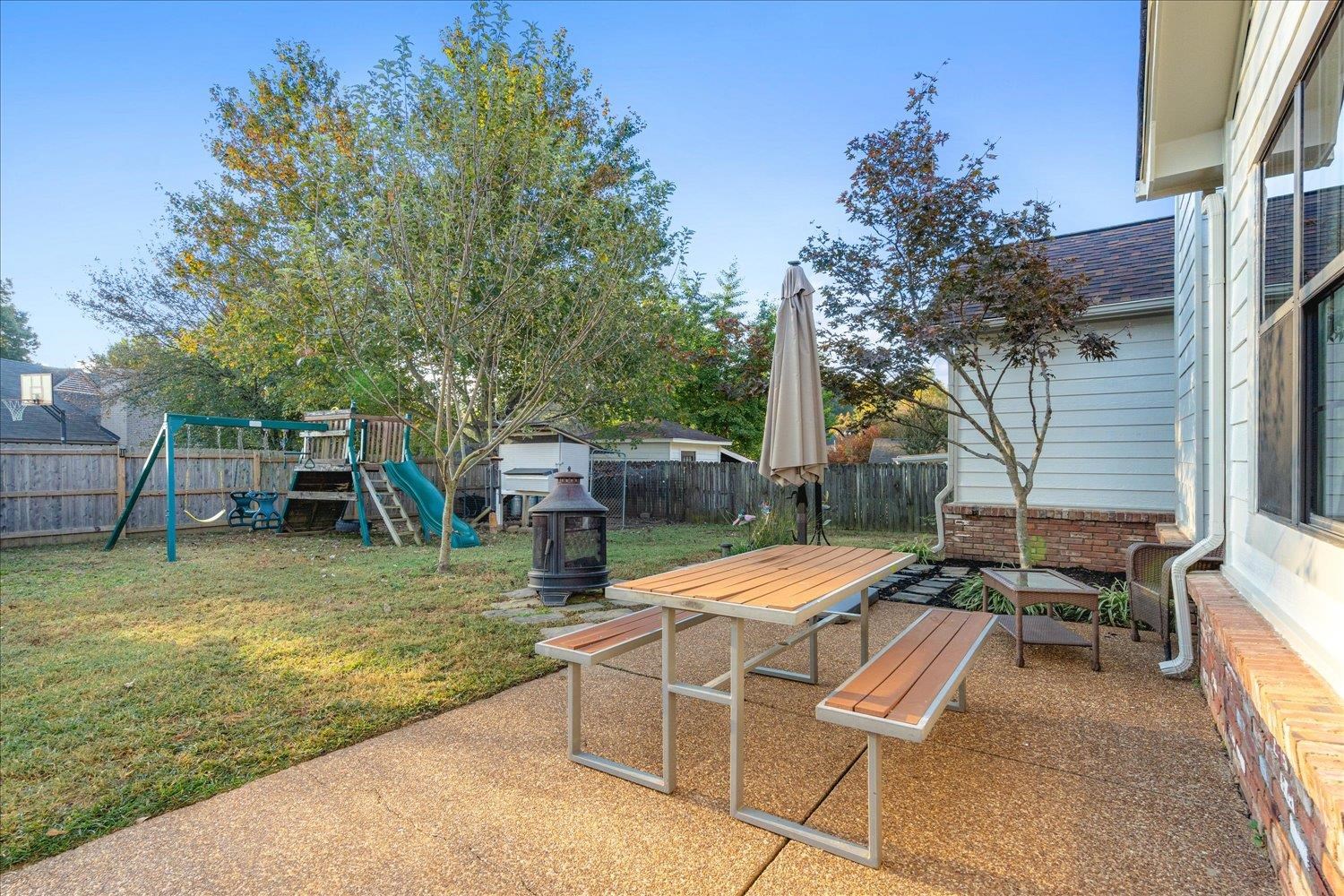6893 Andrews Road Bartlett, TN 38135 - Photo 25 of 30 View of patio / terrace featuring a storage shed and a playground