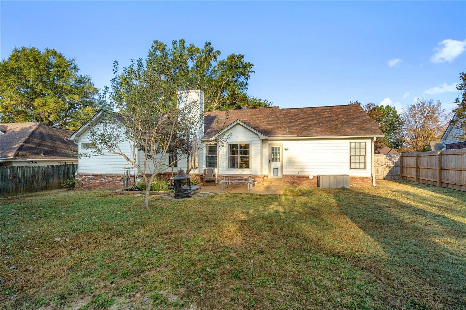 6893 Andrews Road Bartlett, TN 38135 - Photo 30 of 30 Rear view of property featuring a yard and a patio