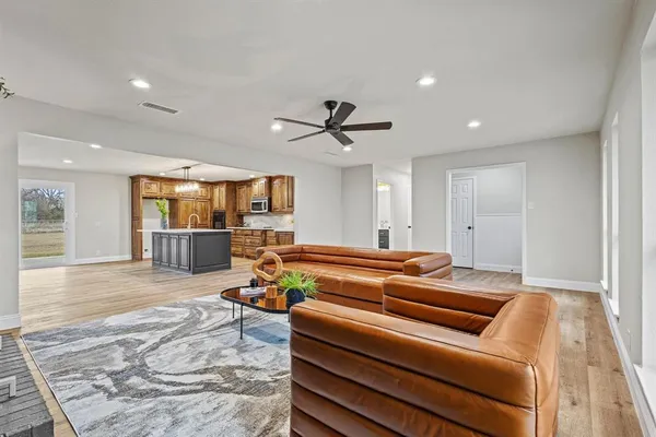 a living room with furniture and a table