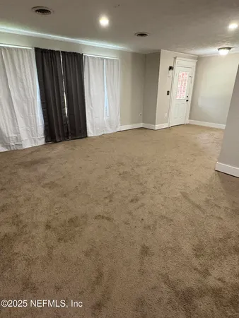 an empty room with an entryway