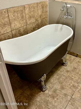 a bathroom with a sink a toilet a mirror and vanity