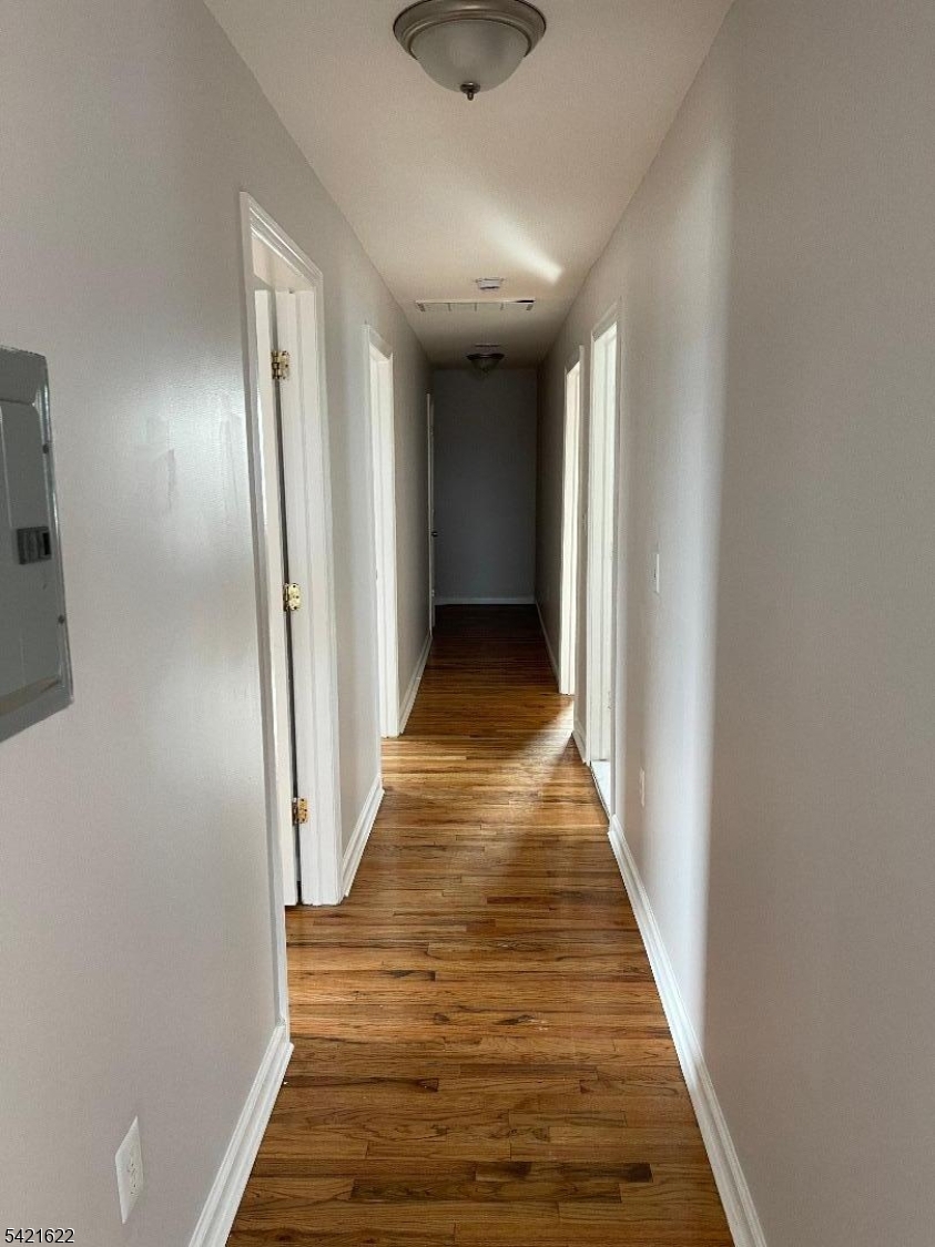 784 South 19th Street, Unit 2 Newark, NJ 07103 - Photo 11 of 11 a view of a hallway with wooden floor