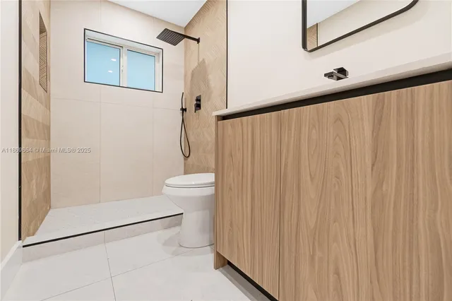 a view of a room that has a window in it