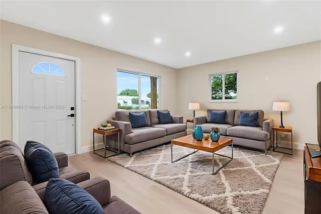a living room with furniture and a couch