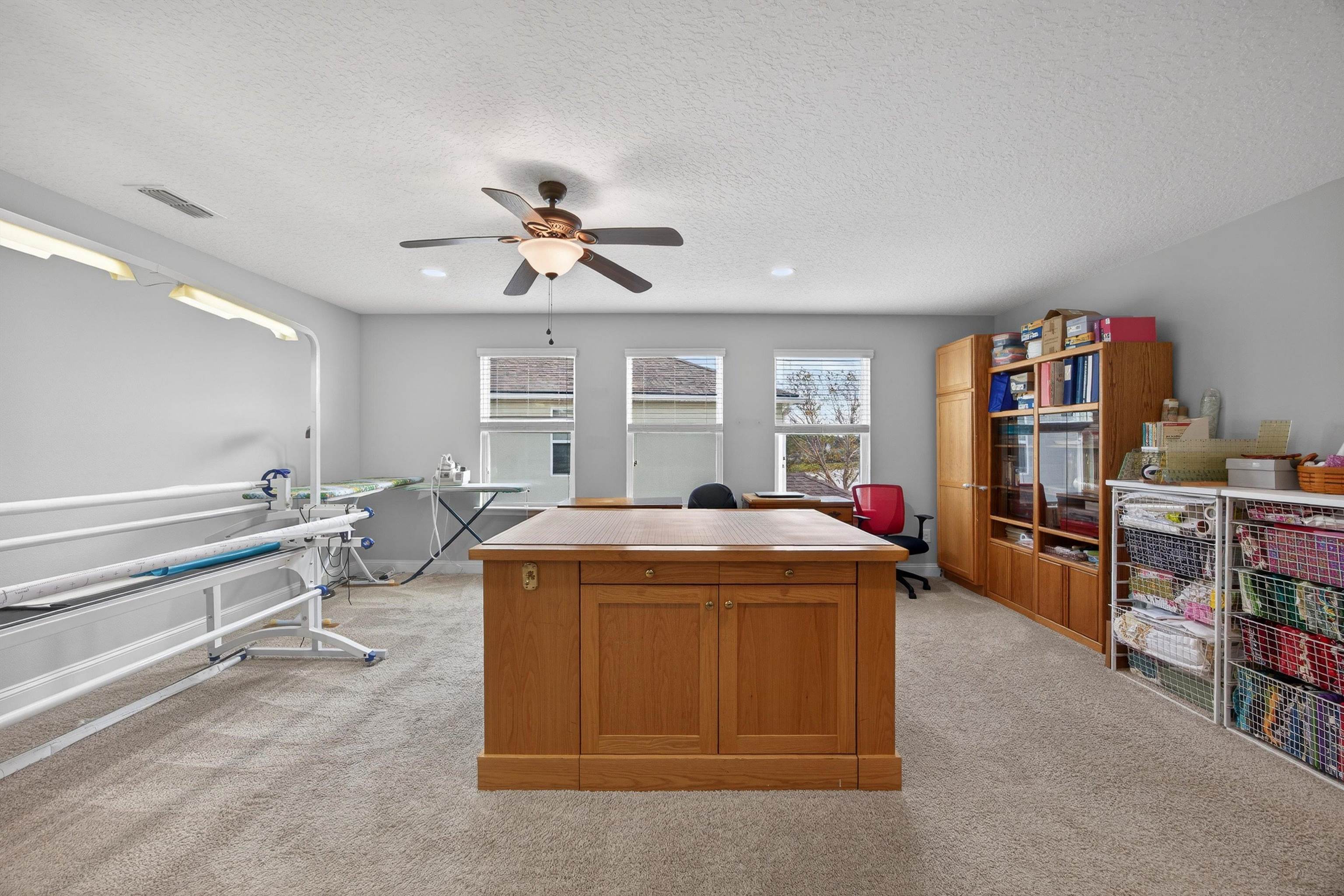 50 Sierras Loop St. Augustine, FL 32086 - Photo 21 of 37 a living room with furniture and a flat screen tv