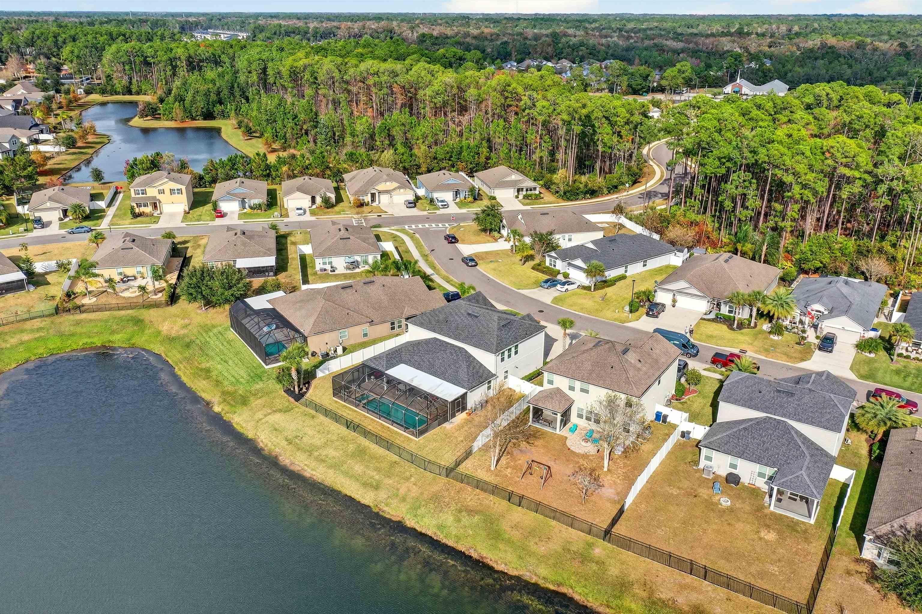 50 Sierras Loop St. Augustine, FL 32086 - Photo 25 of 37 an aerial view of a house with a lake view