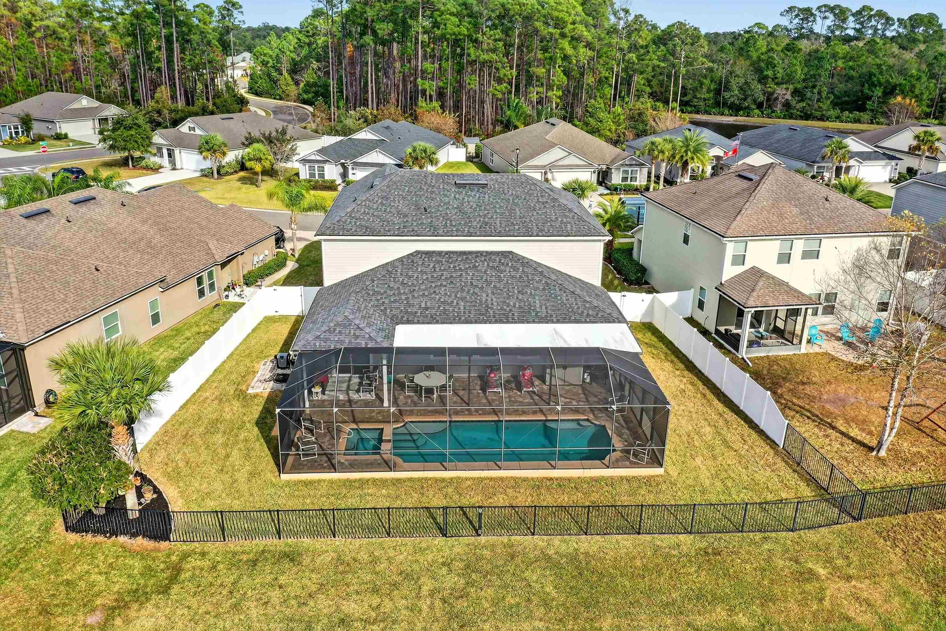 50 Sierras Loop St. Augustine, FL 32086 - Photo 29 of 37 an aerial view of a house with a yard basket ball court and outdoor seating