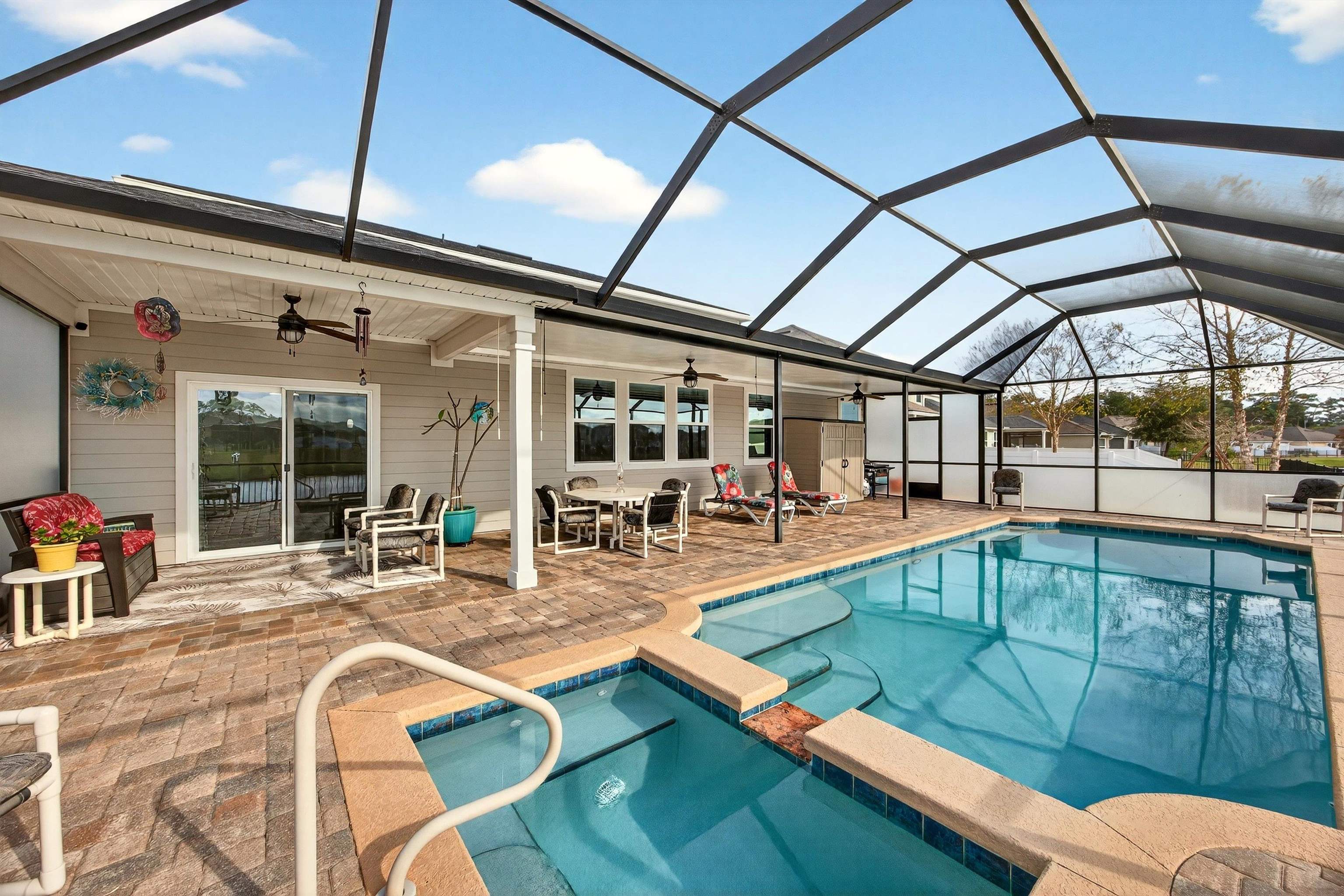50 Sierras Loop St. Augustine, FL 32086 - Photo 3 of 37 a view of a swimming pool with a patio