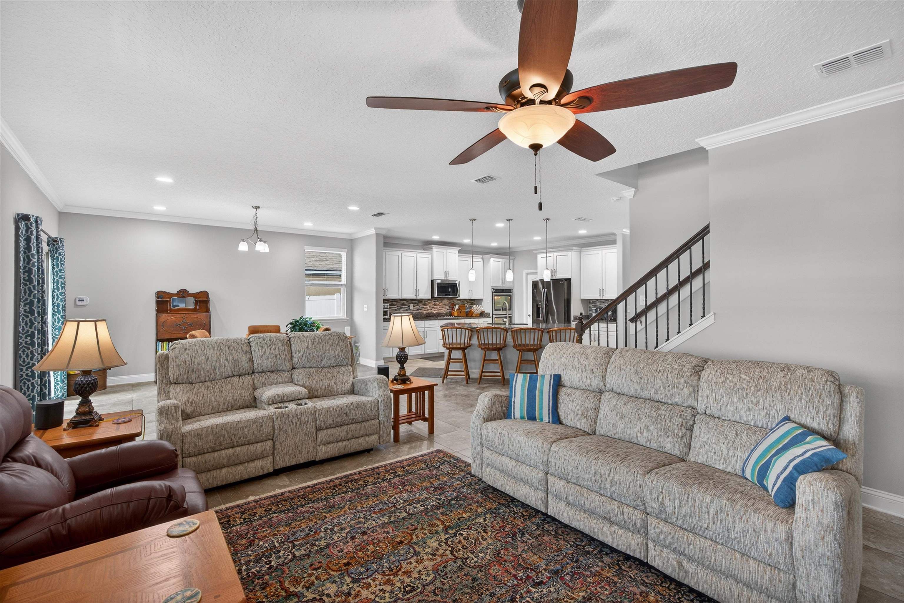 50 Sierras Loop St. Augustine, FL 32086 - Photo 7 of 37 a living room with furniture and a chandelier