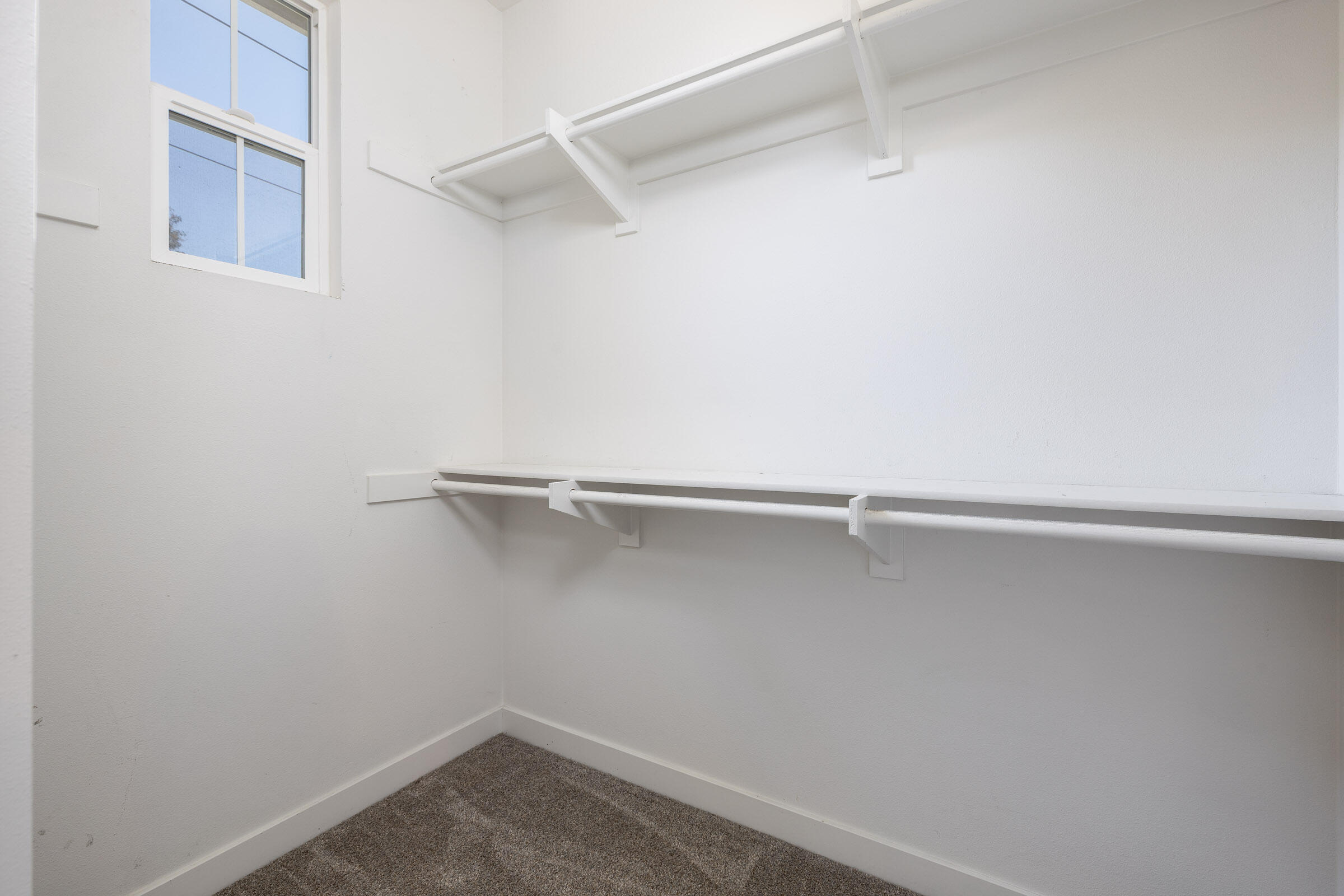 5685 Surfrider Way, Unit 105 Goleta, CA 93117 - Photo 24 of 29 Primary Walk-In Closet