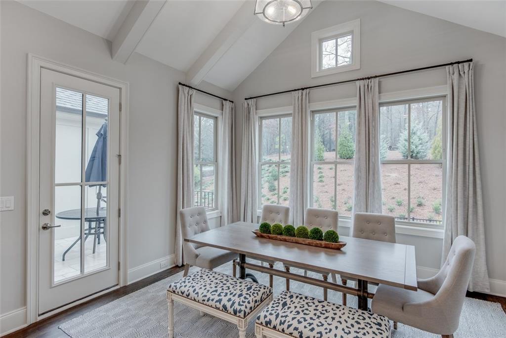 3450 Commander Cove Suwanee, GA 30024 - Photo 19 of 51 a view of a workspace with furniture and a window