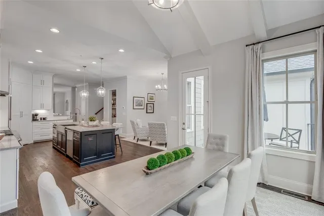 a view of cabinets and wooden floor