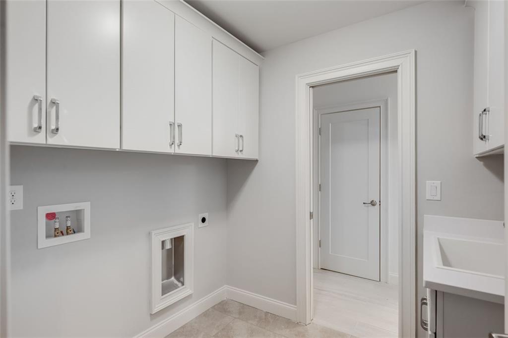 3450 Commander Cove Suwanee, GA 30024 - Photo 29 of 51 a view of cabinets and wooden floor